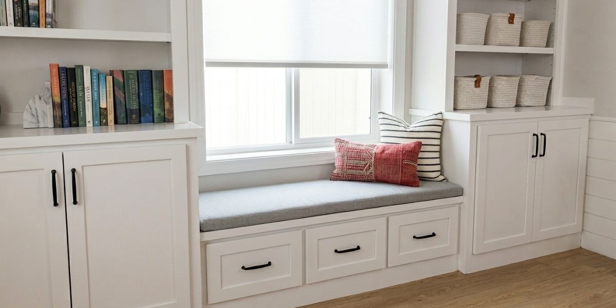 Firm Sunbrella Cushion Fits Snugly Between Crisp White Built-Ins