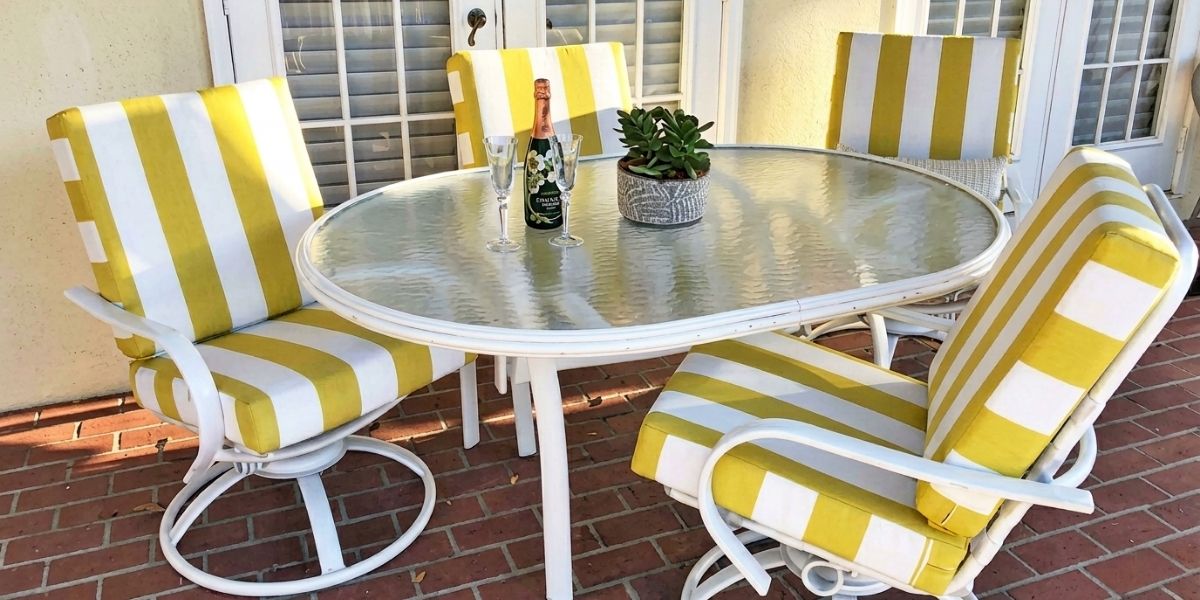 Bold Striped Sunbrella Cushions Provide Pop of Yellow on Patio Seating