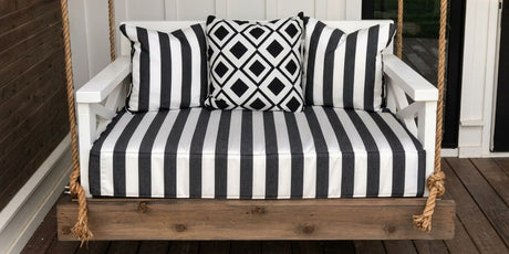 Classic Black and White Sunbrella Doesn't Disappoint on This Rustic Porch Swing Stunner