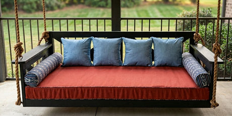 Unexpected Sunbrella Hues Come Together Vividly on This Cozy Porch Swing Daybed