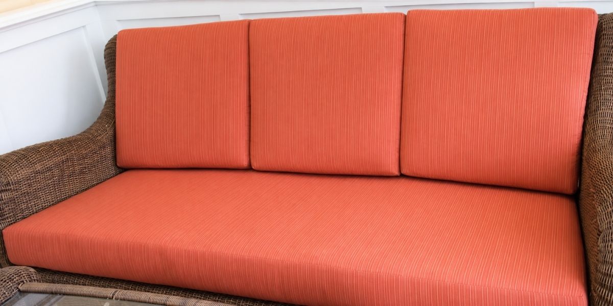 Go Bold With Color and Texture Using Sunbrella Dupione Papaya on Wicker Patio Furniture