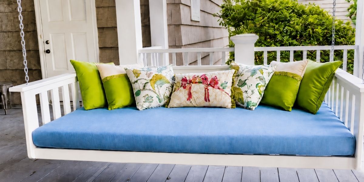 Sunbrella Canvas Air Blue Daybed Cushion Shines on Bright Porch