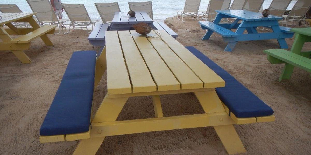 Sunbrella RAIN Bench Cushions Add Playful Vibe to Beach Picnic Tables - Patio Lane