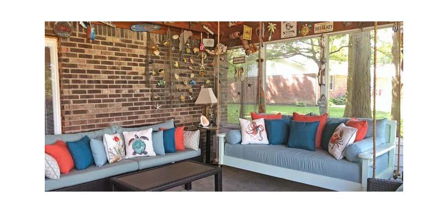 Vacation is Every Day in This Beachy Sunroom With Sunbrella Cushions and Pillows