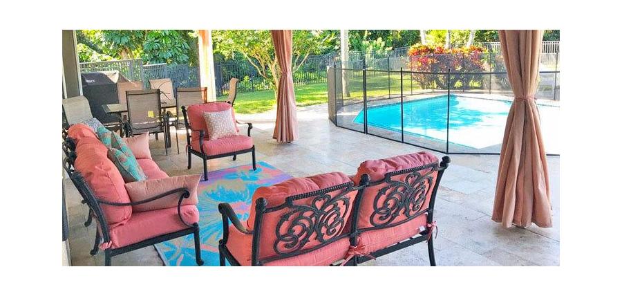 Pool Deck Brightened Up With Sunbrella Curtain Panels, Cushion Covers, and Pillows