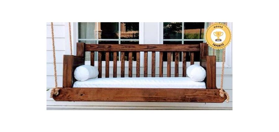 Traditional Porch Swing Stands Out With Classic White Sunbrella Cushions