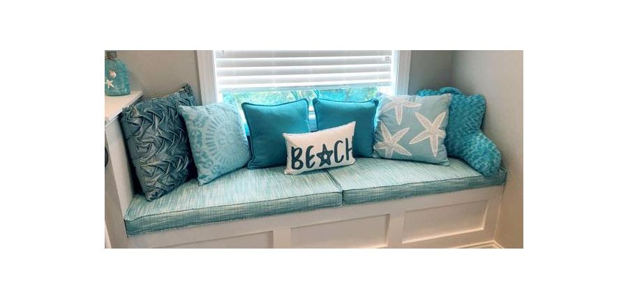 Perfect Pair of Bench Cushions Form this Nautical Themed Space