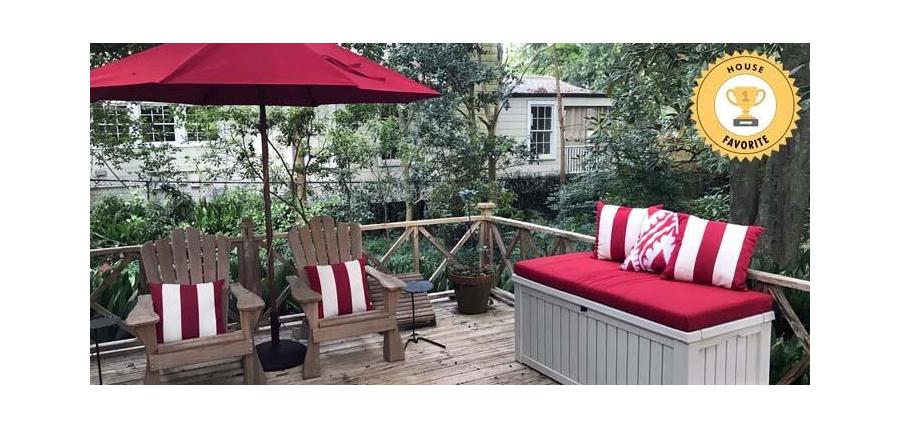 Bold Cherry Red Patio Accents Pop on Rustic Deck