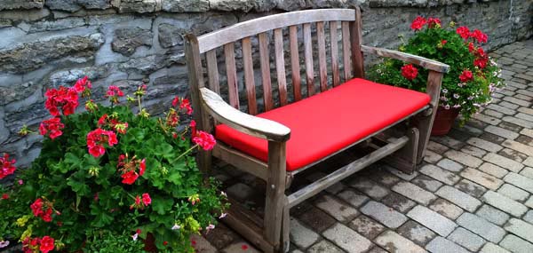 Sunbrella RAIN Bench and Chair Cushions in Canvas Jockey Red Revitalize Garden Seating