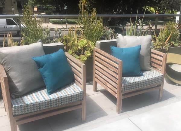 Modern Courtyard Patio Updated With Coordinating Sunbrella Prints and Solids