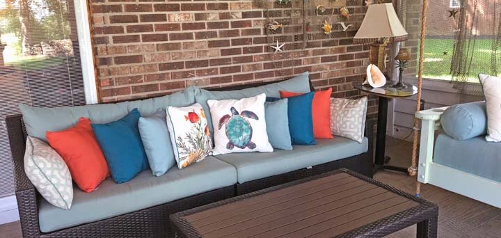 Vacation is Every Day in This Beachy Sunroom With Sunbrella Cushions and Pillows