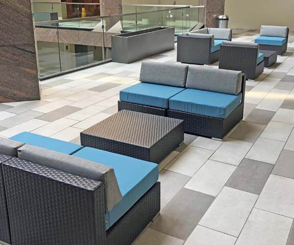 Sunbrella Blue and Gray Chair Cushions Unite Office Gathering Space